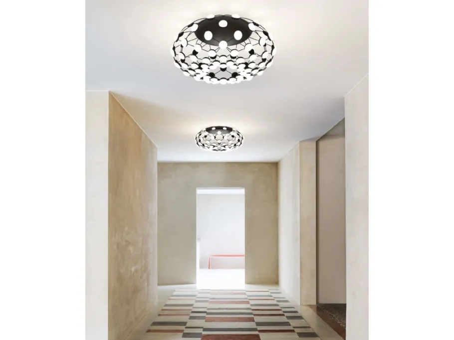 Lampada a soffitto Mesh con struttura in acciaio con lenti in policarbonato di Luceplan